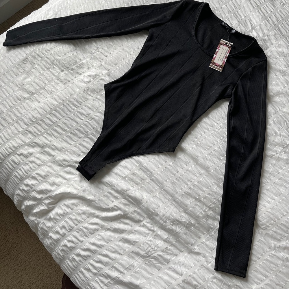 Sleek bodysuit. New!